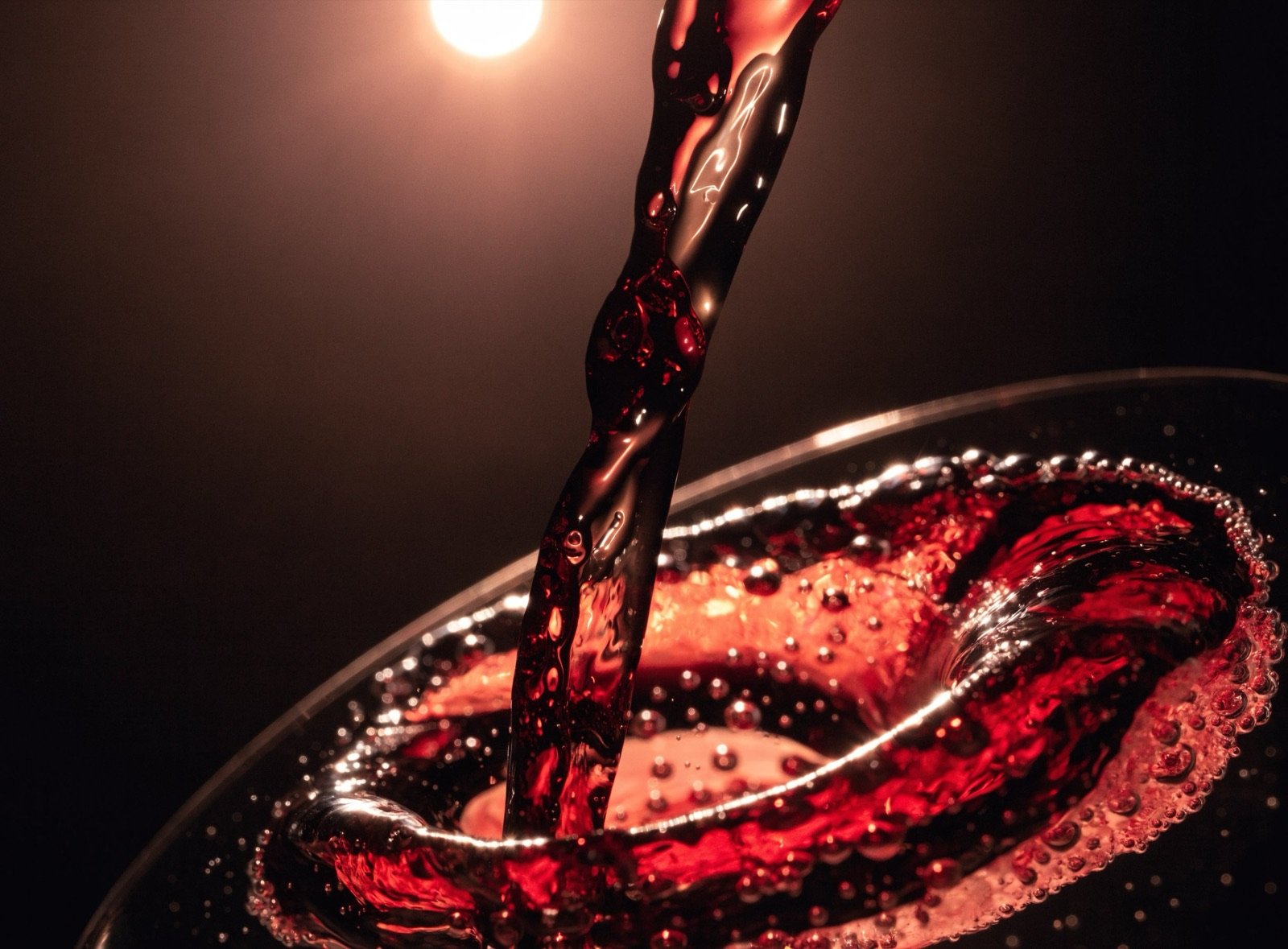Wine being poured, macro detail